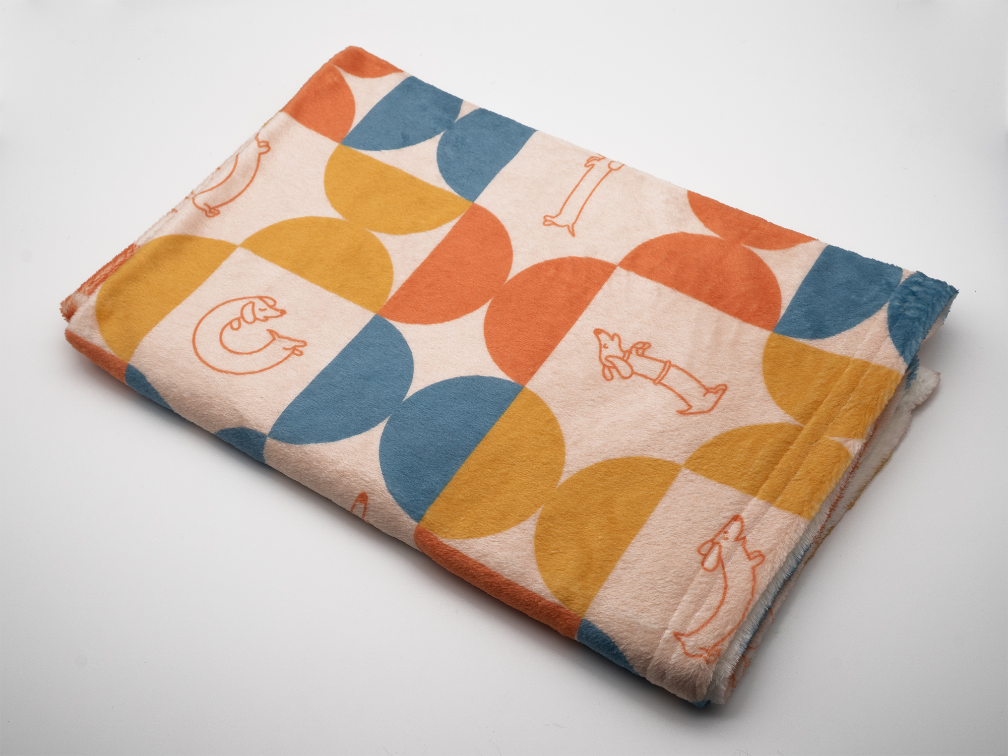 Kuscheldecke mit Retro-Dackelprint